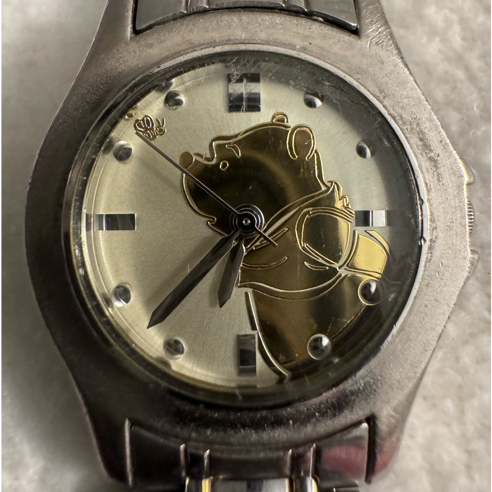 Vintage Winnie the Pooh watch by Disney from the 80s in silver gold tone